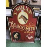 A LARGE VINTAGE WOODEN T.NOLAN BLACKSMITH SIGN, HEIGHT 92CM