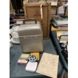 A VINTAGE G. B. BELL & HOWELL 8MM PROJECTOR TO INCLUDE ORIGINAL BOX, INSTRUCTIONS, ETC