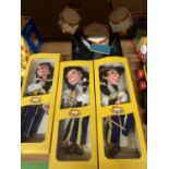 THREE BOXED PELHAM PUPPETS TO INCLUDE THE GUITARIST, SAXAPHONE, THE DRUMMER AND A SET OF DRUMS