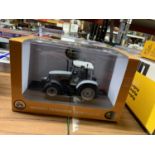 A LIMITED EDITION OF 2500 UNIVERAL HOBBIES MODEL MASSEY FERGUSON 5470 TRACTOR 1:32