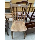 A VICTORIAN ELM AND BEECH SPINDLE BACK KITCHEN CHAIR