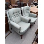A PAIR OF MODERN FIRESIDE CHAIRS ON CABRIOLE FRONT LEGS