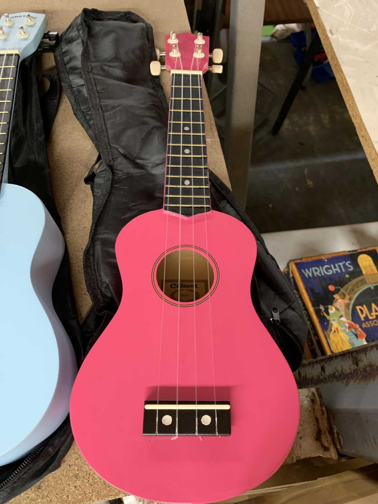 A PINK AND A BLUE CHILD'S UKELELE IN BAGS - Image 3 of 3