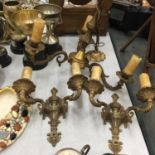 AN ORNATE BRASS CEILING LAMP WITH THREE CANDLE BRANCHES PLUS A MATCHING PAIR OF WALL LIGHTS