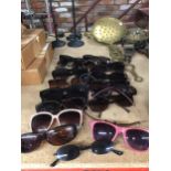 A LARGE AMOUNT OF VINTAGE SUNGLASSES