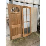 THREE INTERNAL PINE DOORS AND A FRONT DOOR WITH UPPER GLAZED WINDOW