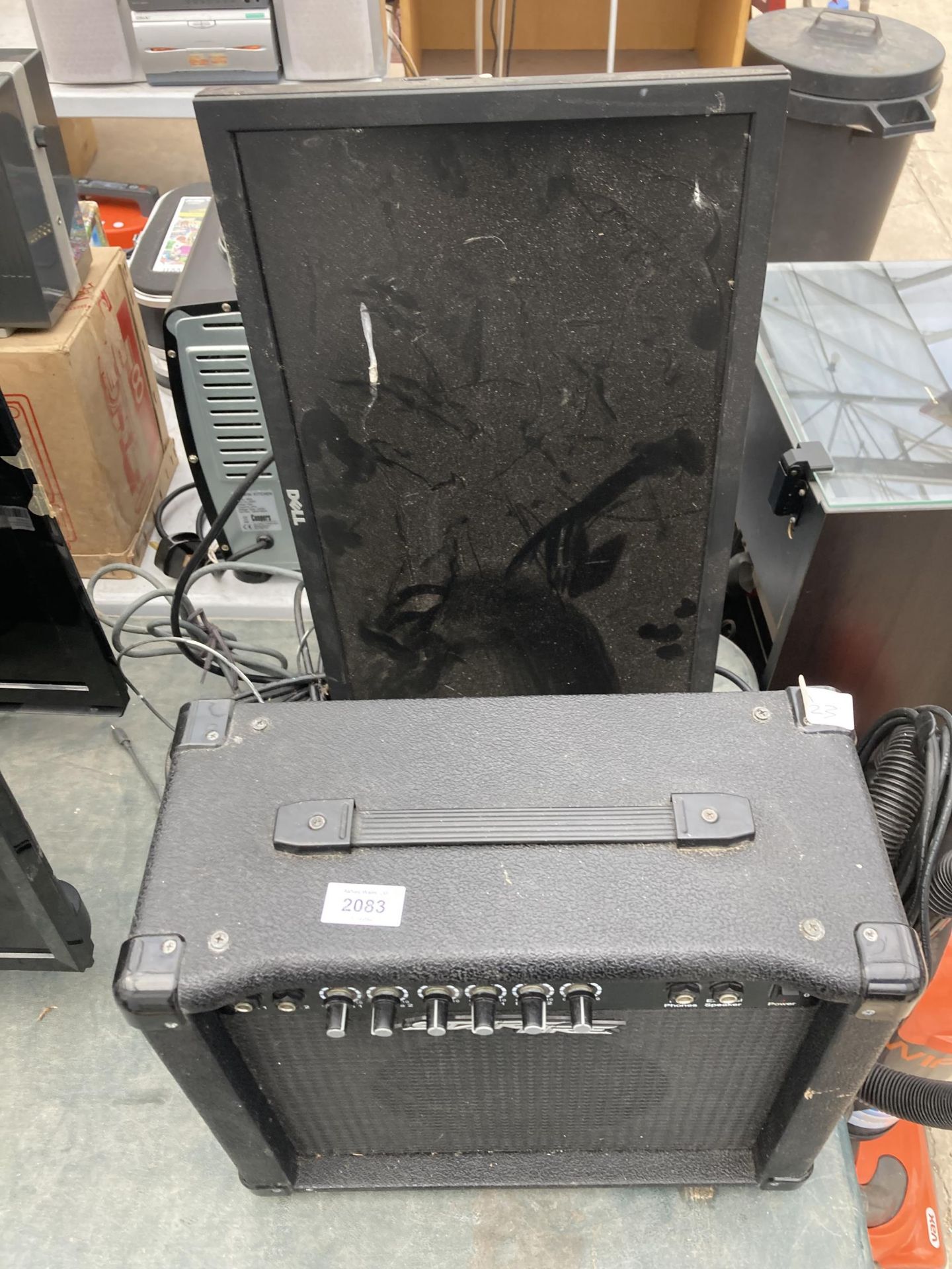 A STARFIRE GUITAR AMPLIFIER AND A DELL COMPUTER MONITOR