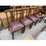 A SET OF FOUR EARLY 20TH CENTURY OAK DINING CHAIRS