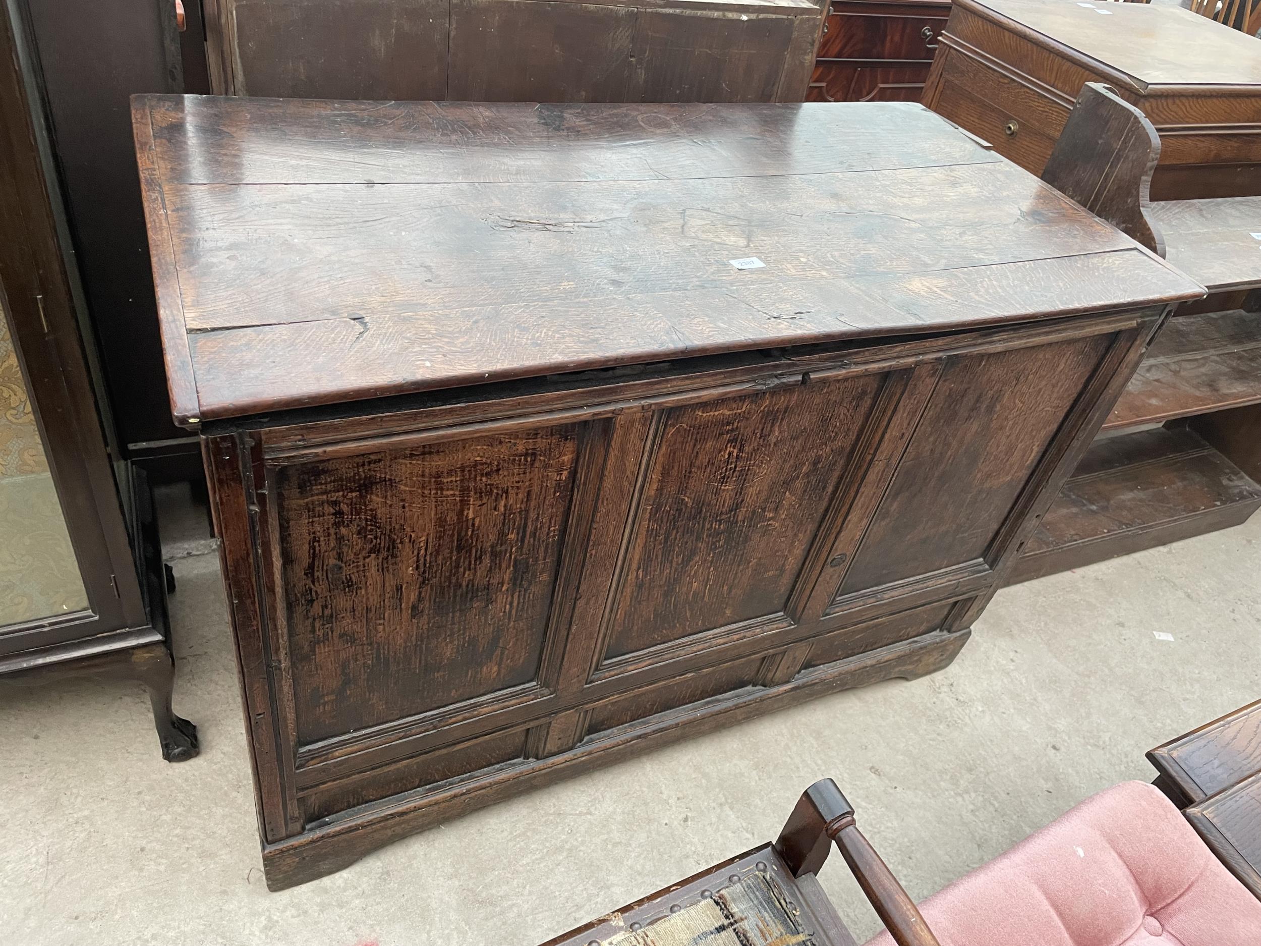 AN 18TH CENTURY OAK BLANKET CHEST WITH PANELLED FRONT, 47" WIDE