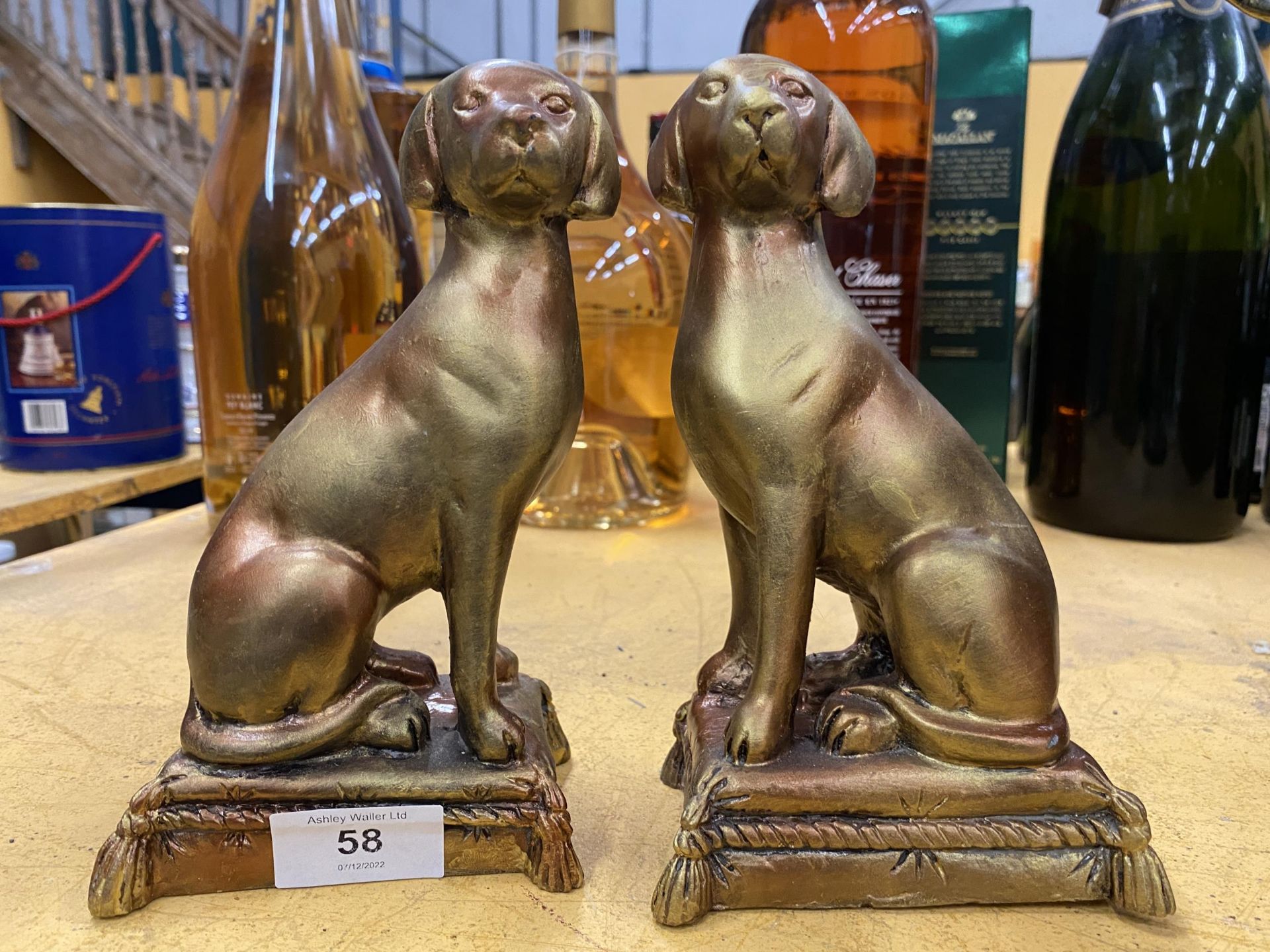 A PAIR OF DECORATIVE DOG ORNAMENTS