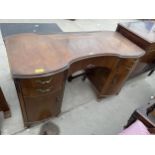 A MID 20TH CENTURY INVERTED BOWFRONTED WALNUT DRESSING TABLE, 50" WIDE
