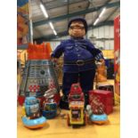 VARIOUS ITEMS TO INCLUDE A TINPLATE ROCKET, ROBOTS, LAUGHING POLICEMAN ETC
