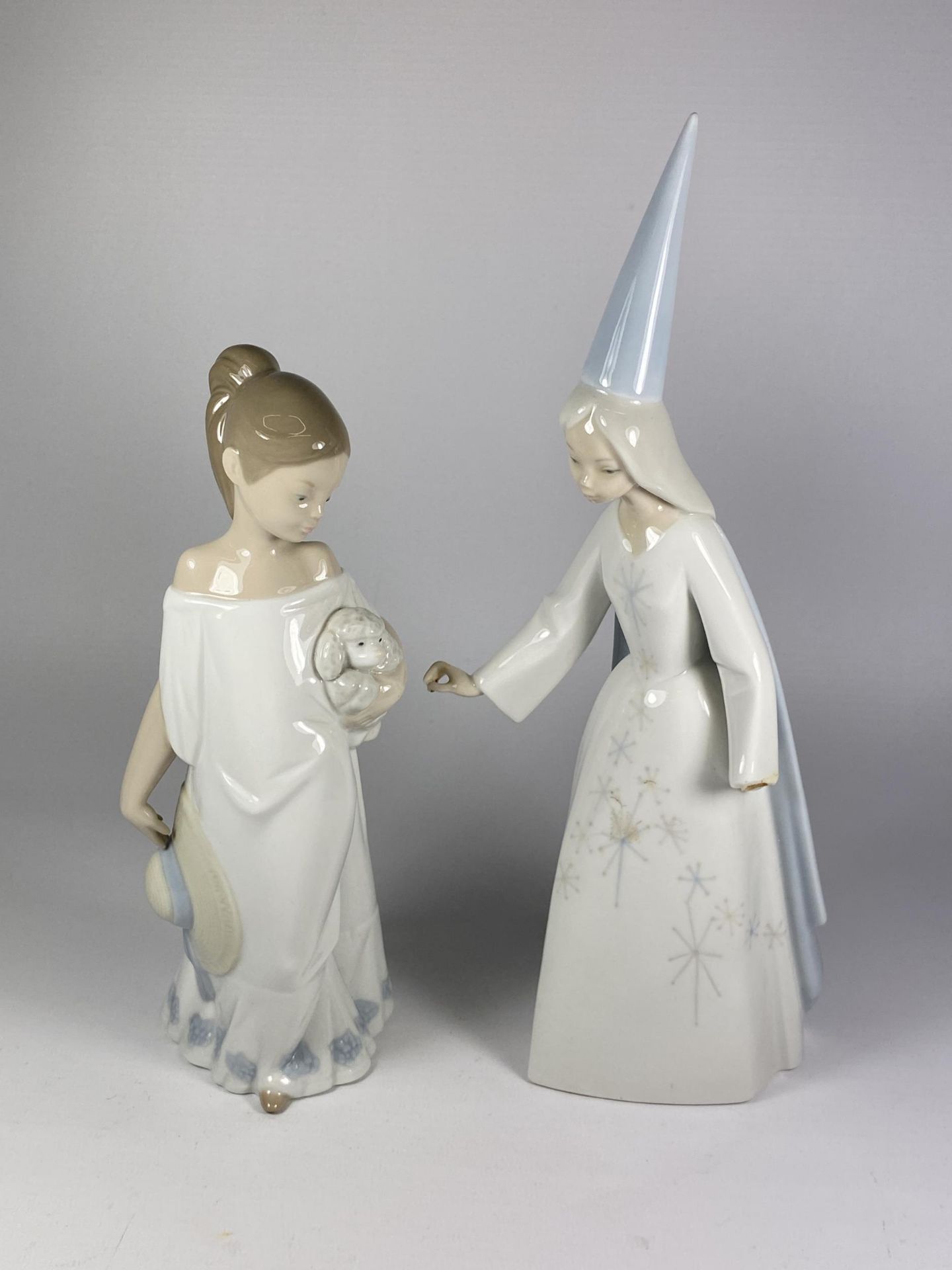 TWO CERAMIC FIGURES - ONE NAO AND ONE LLADRO (HAND A/F)