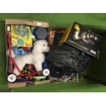 A LARGE MIXED LOT OF TOYS TO INCLUDE RIDE/PUSH ALONG DOG, GAMES, ETC