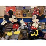 A MICKEY AND MINNIE MOUSE WOODEN WALL HANGINGS