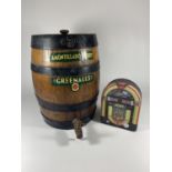 A VINTAGE 'GREENALLS' AMONTILLADO SHERRY WOODEN BARREL AND MINIATURE GIFT SET (2)