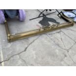 AN EXTENDABLE BRASS FIRE FENDER