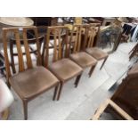 A SET OF FOUR RETRO TEAK NATHAN DINING CHAIRS