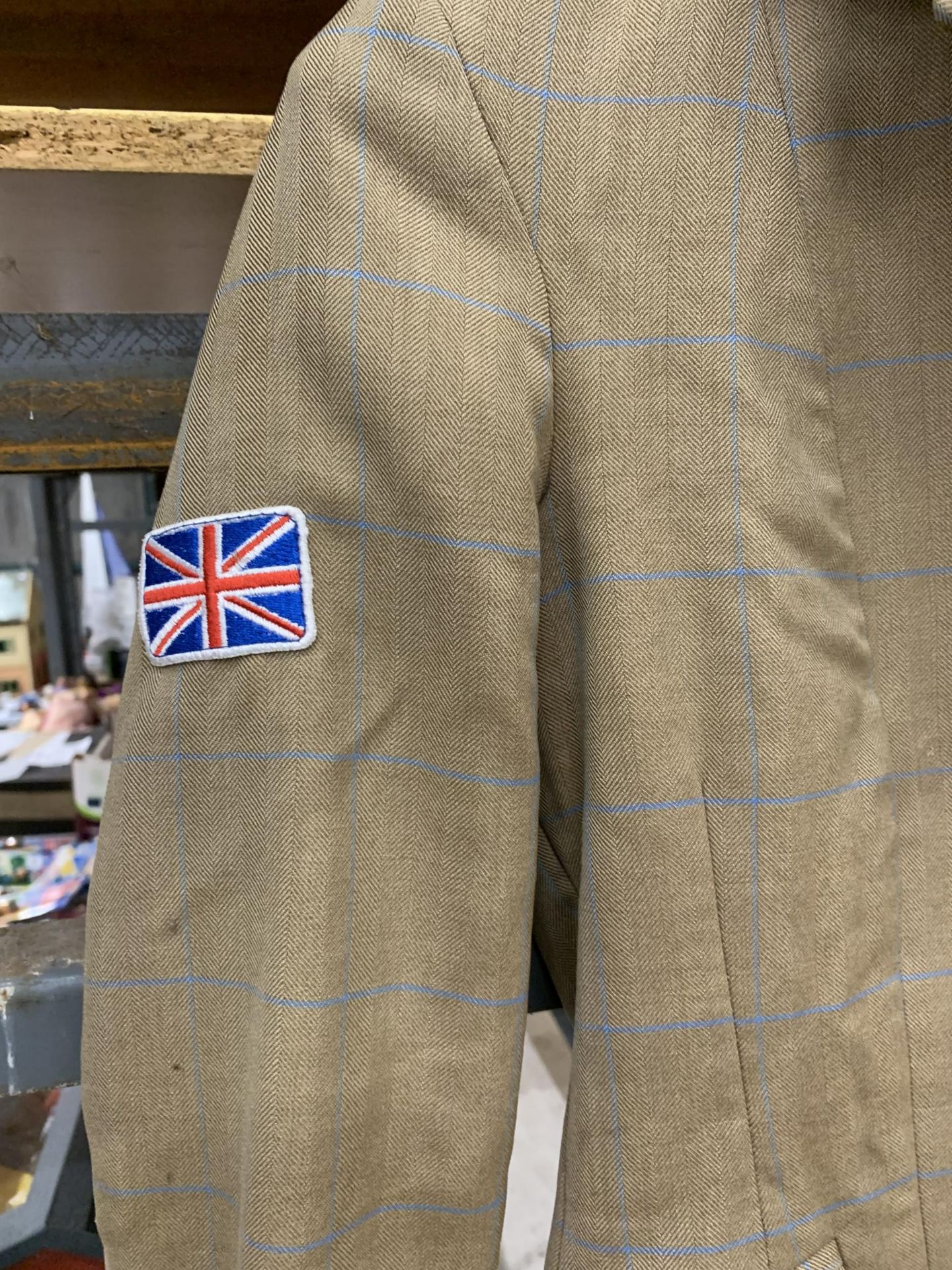 AN EQUIPORT SIZE 8 SHOWING JACKET, TWEED STYLE PATTERN, UNION JACK BADGE ON THE ARM, BACK VENTS, - Image 2 of 3