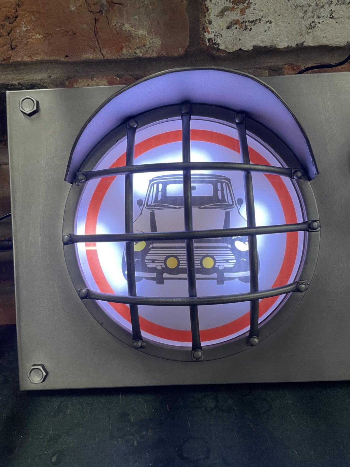 A MINI ILLUMINATED LIGHT BOX SIGN WITH THREE IMAGES IN SEPERATE HEADLIGHT DESIGN- WORKING ORDER AT - Image 2 of 5