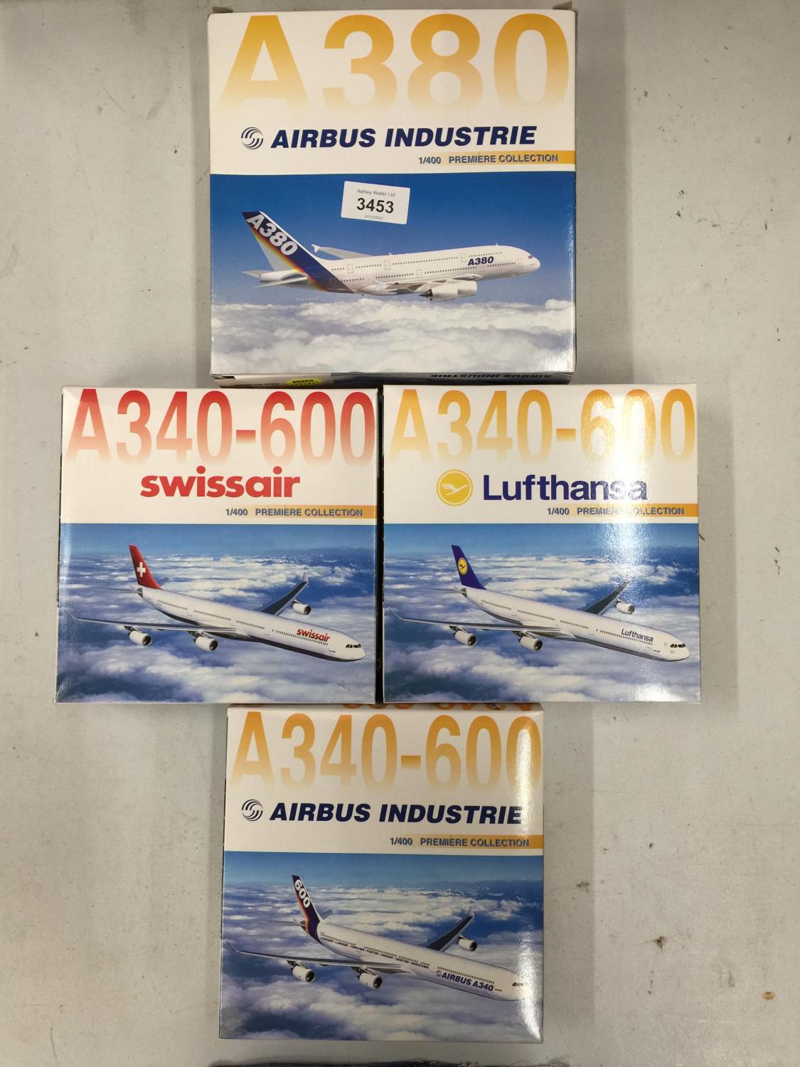 FOUR ASSORTED BOXED MODEL AEROPLANES, SWISSAIR ETC