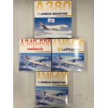 FOUR ASSORTED BOXED MODEL AEROPLANES, SWISSAIR ETC