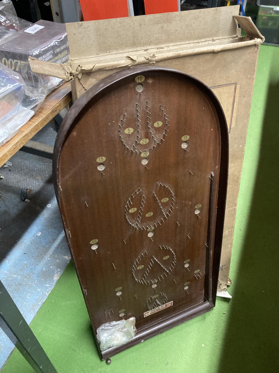 A BOXED VINTAGE CORINTHIAN BAGATELLE BOARD