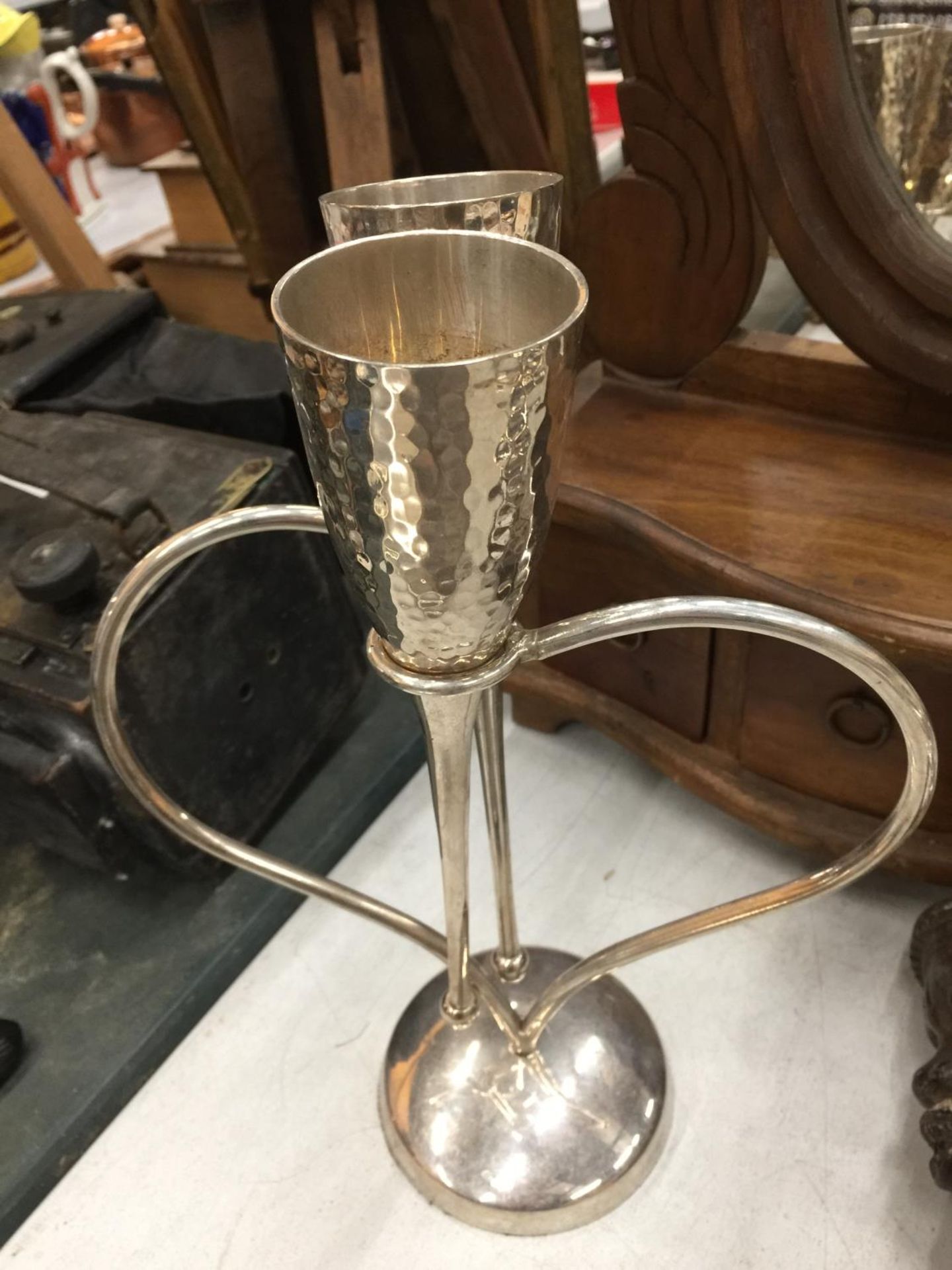 A SILVER PLATED WINE GLASS HOLDER WITH SILVER PLATED CHAMPAGNE FLUTES