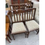 A SET OF FOUR OAK MID 20TH CENTURY DINING CHAIRS