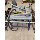 A LARGE CHARNWOOD TABLE SAW COMPLETE WITH EXTRACTOR AND GUIDE BARS ETC