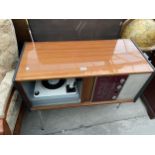 A 'MARCONIPHONE' RADIOGRAM WITH TAMBOUR FRONT AND 'GARRARD' DECK, 34" WIDE