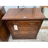 A LATE VICTORIAN WALNUT CHEST OF FOUR DRAWERS, 26" WIDE