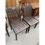 A PAIR OF MODERN HARDWOOD PATIO CHAIRS