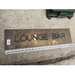 A BRASS 'LOUNGE BAR' SIGN (60CM)