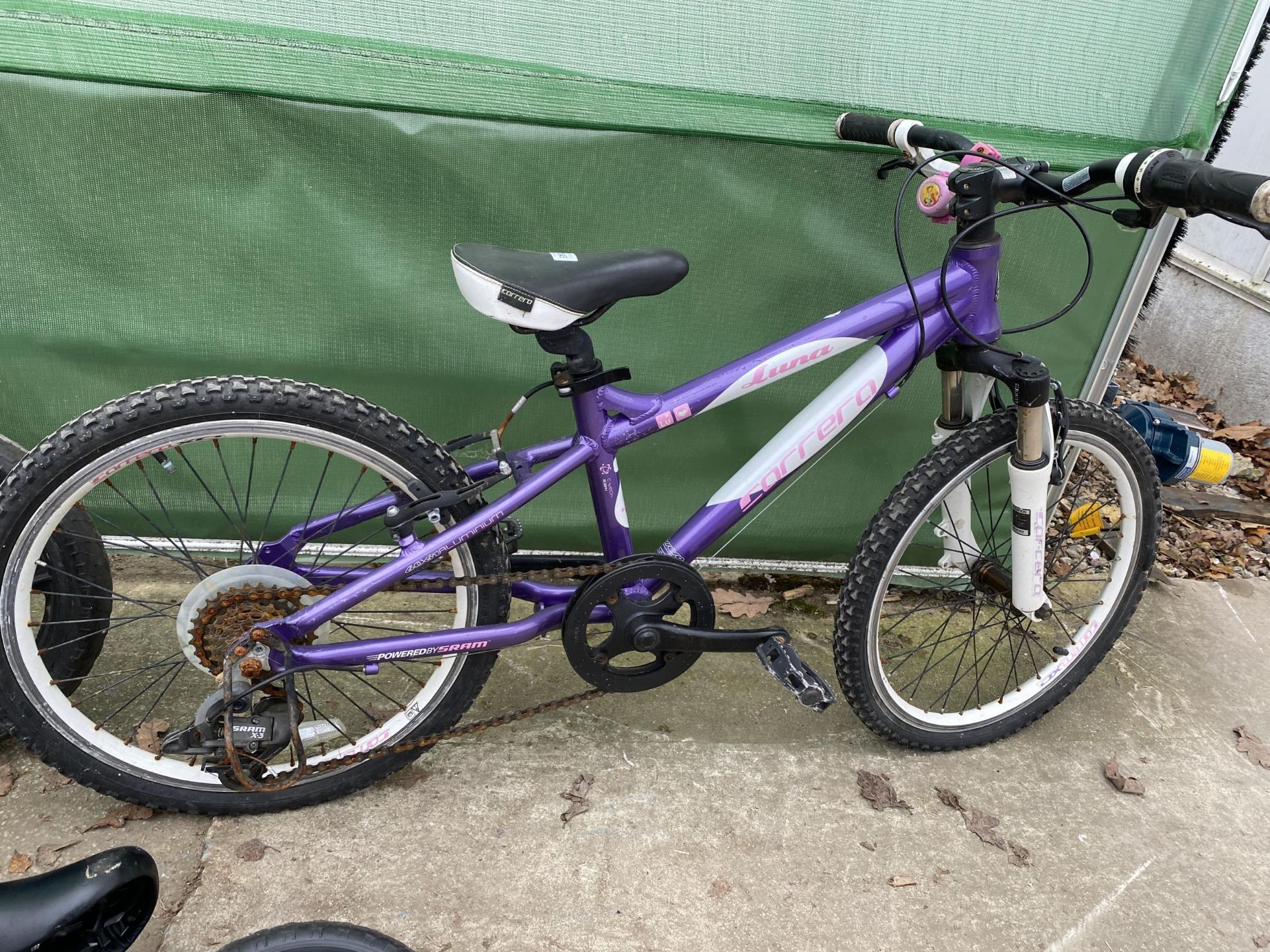 THREE CHILDRENS BIKES TO INCLUDE TWO BALANCE BIKES AND A CARRERA LUNA GIRLS BIKE WITH 7 SPEED GEAR - Image 4 of 5
