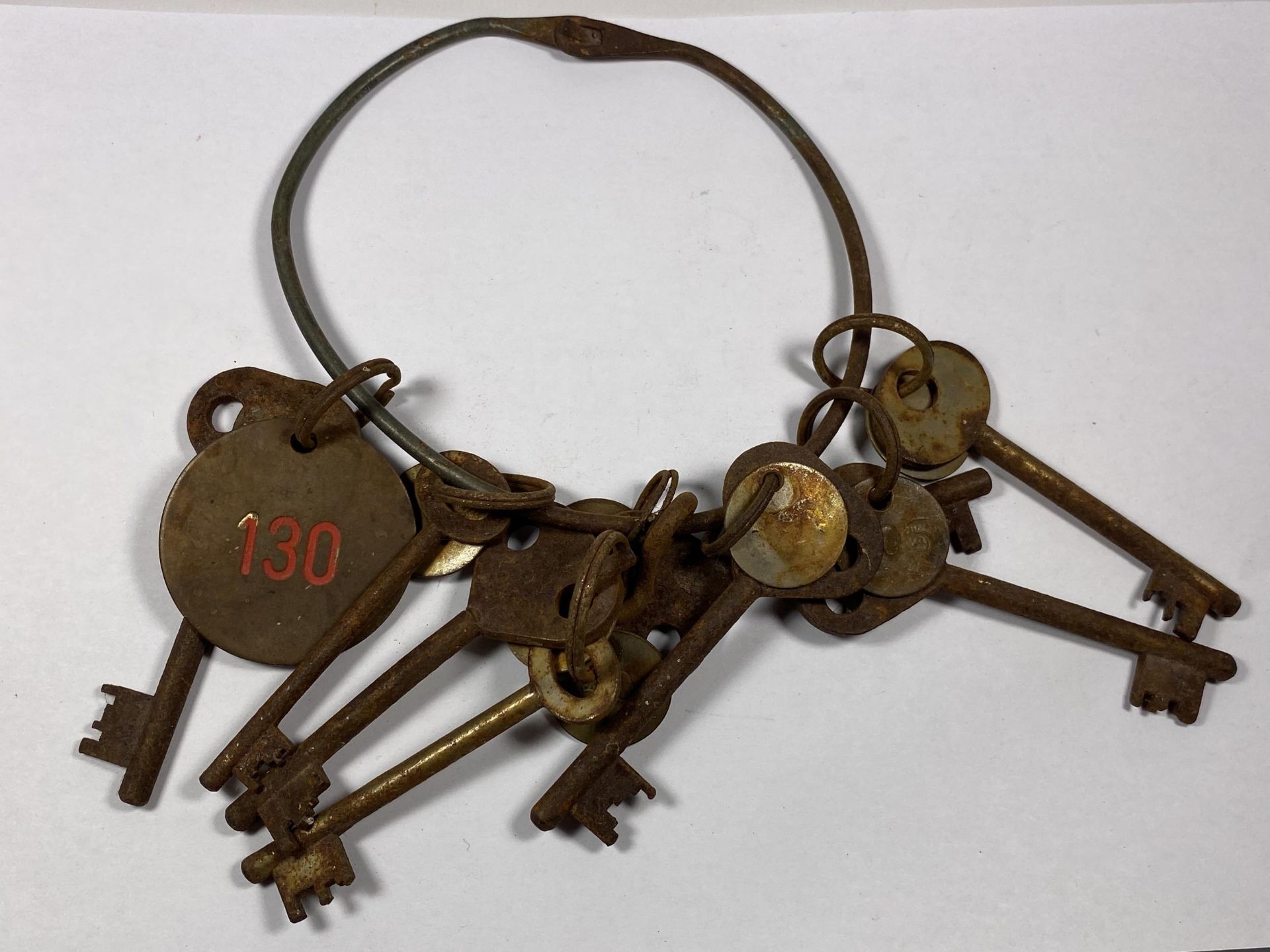 A SET OF VINTAGE POST BOX KEYS