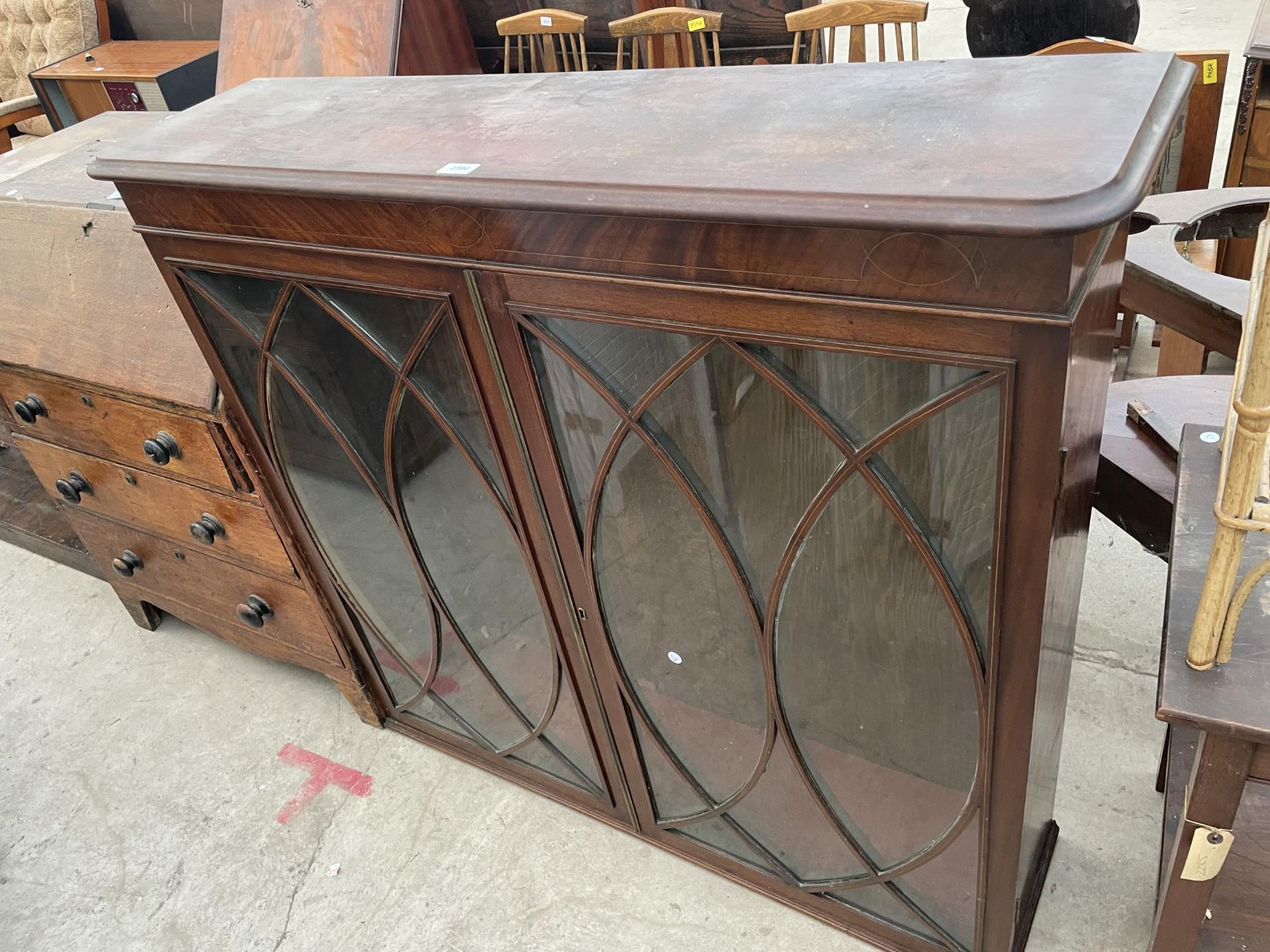 A 19TH CENTURY MAHOGANY TWO DOOR BOOKCASE TOP