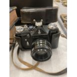 A VINTAGE ZENIT EM CAMERA IN A LEATHER CASE