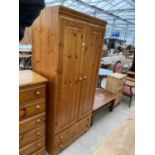 A MODERN PINE TWO DOOR WARDROBE, 33" WIDE