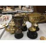 FOUR SILVER PLATED TROPHY CUPS ALL FROM LEIGH SAILING CLUB PLUS A BRASS TEAPOT