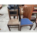 A 19TH CENTURY OAK COUNTRY CHAIR AND PIERCED SPLAT BACK DINING CHAIR