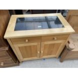 A MODERN OAK SIDEBOARD WITH INSET POLISHED GRANITE TOP, 31.5" WIDE