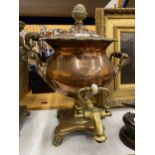 A DECORATIVE BRASS & COPPER SAMOVAR WITH ACORN FINIAL