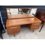 A RETRO TEAK DRESSING TABLE ENCLOSING FOUR DRAWERS AND CENTRAL PULL OUT SLIDE, 60" WIDE