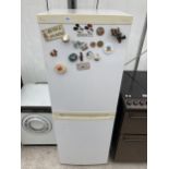 A WHITE BEKO UPRIGHT FRIDGE FREEZER BELIEVED IN WORKING ORDER BUT NO WARRANTY