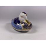 A ROYAL CROWN DERBY DUCK WITH GOLD COLOURED STOPPER