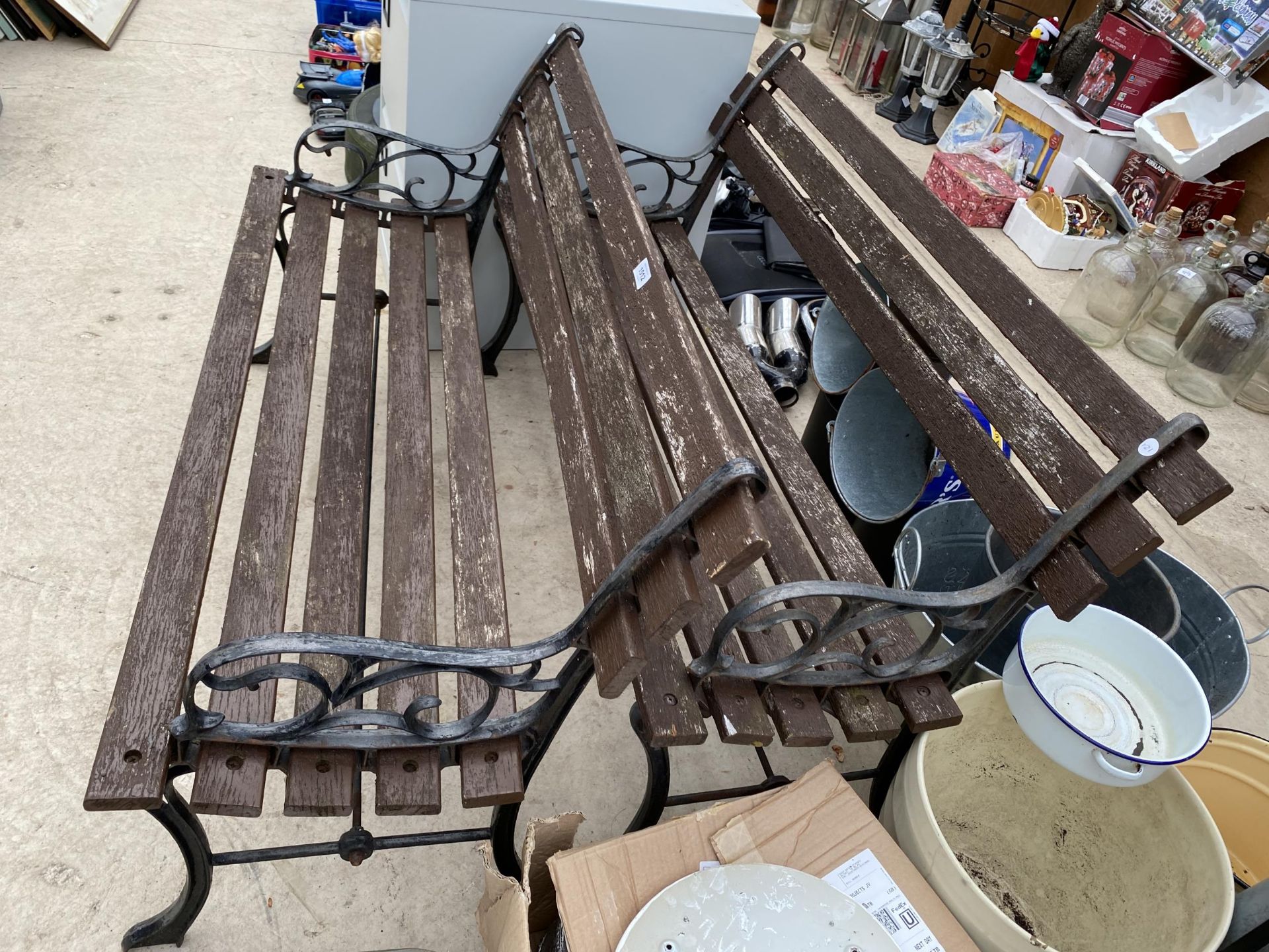 A PAIR OF WOODEN SLATTED GARDEN BENCHES WITH CAST BENCH ENDS - Image 2 of 2