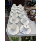 TWELVE ROYAL WORCESTER ESPRESSO CUPS AND SAUCERS