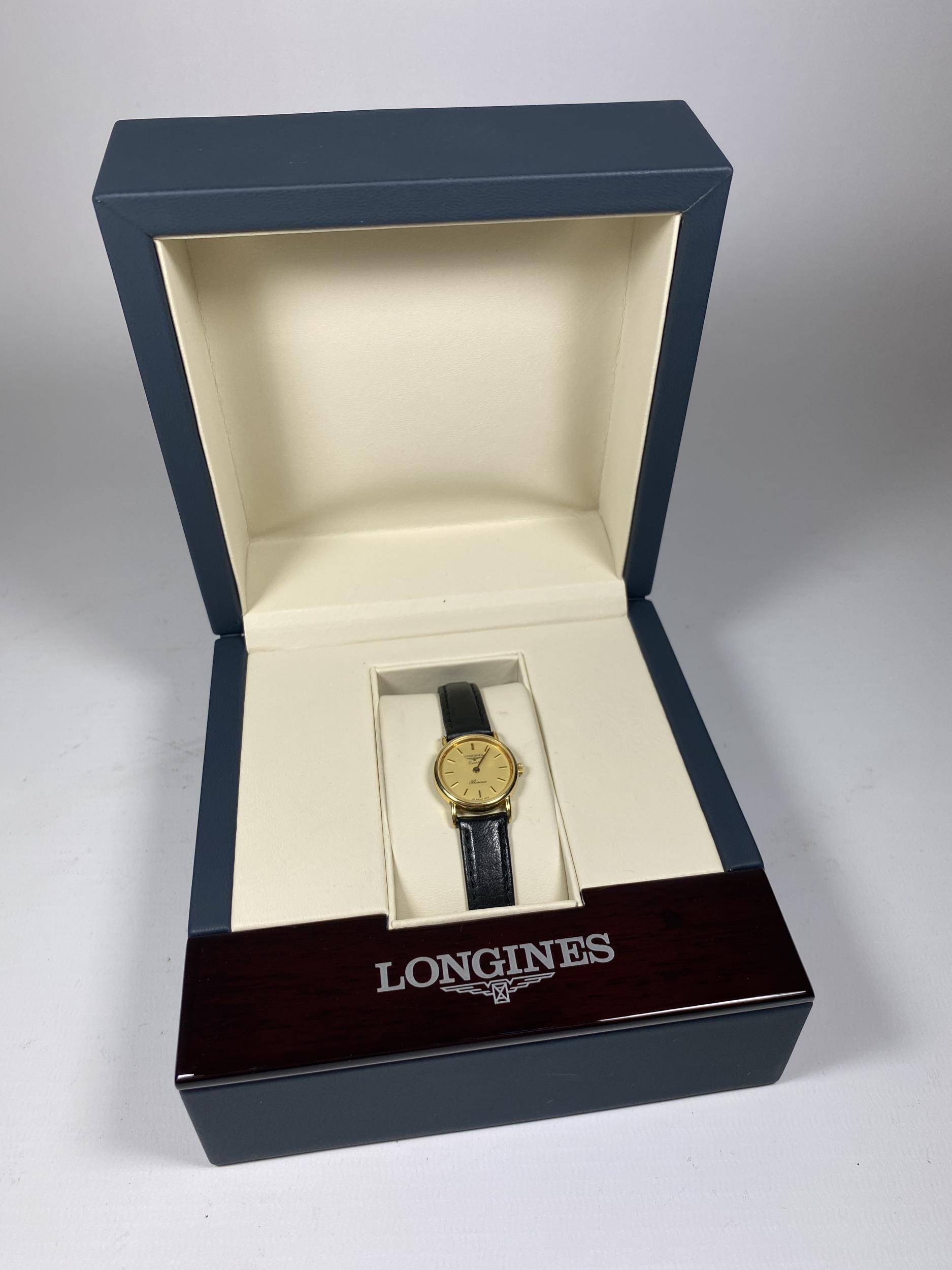 A LONGINES PRESENCE QUARTZ 9CT YELLOW GOLD CASED WATCH IN LONGINES BOX & RETAILER'S OUTER BOX