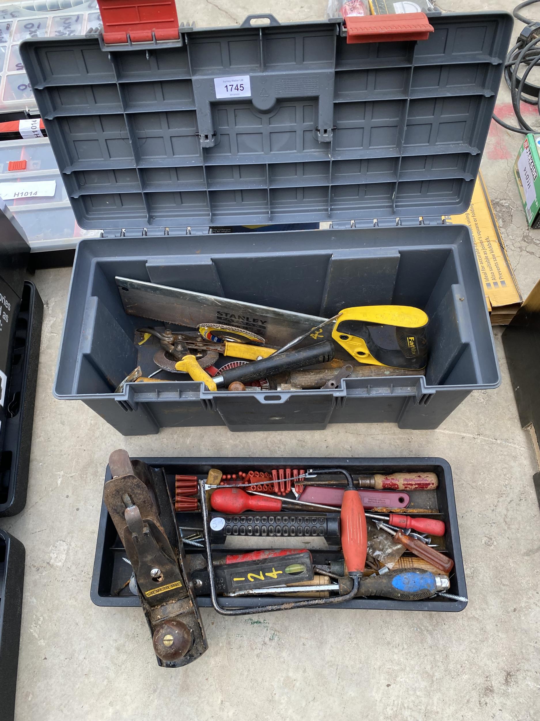 A TOOL BOX WITH AN ASSORTMENT OF TOOLS TO INCLUDE A WOOD PLANE AND A BRACE DRILL ETC